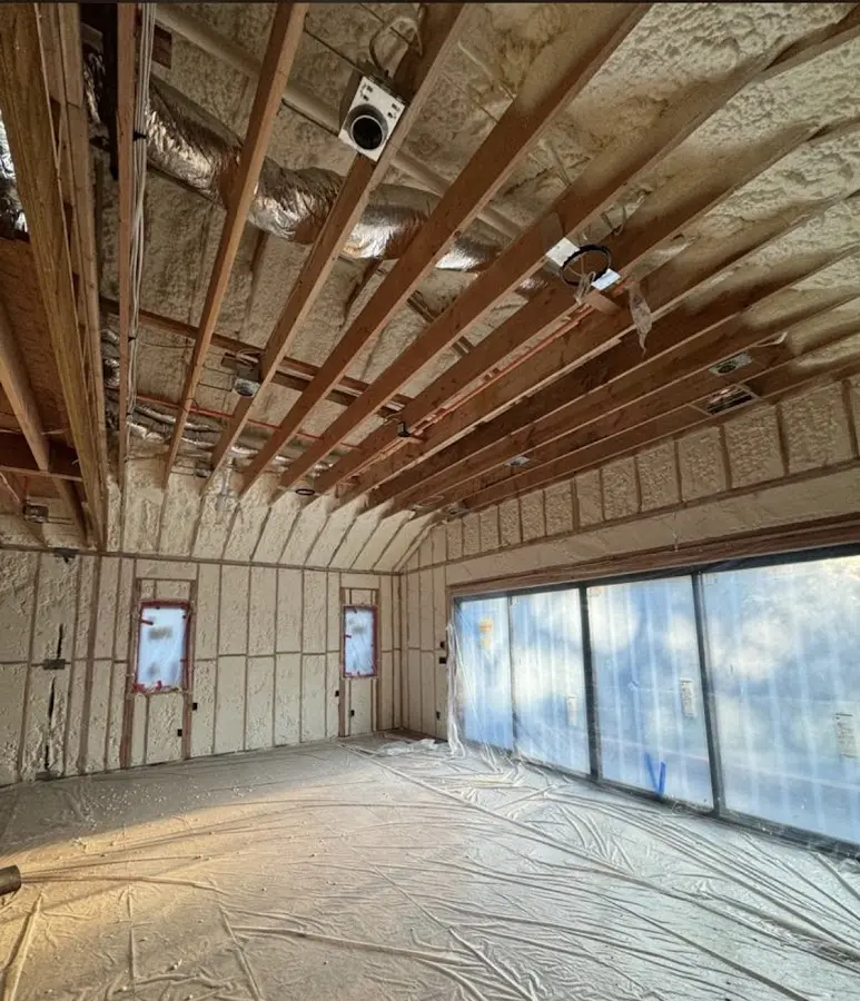 Interior walls and ceiling insulated with spray foam during new construction in Mansfield